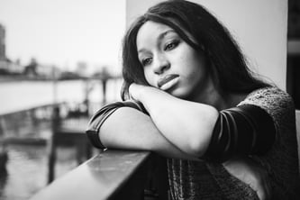 african-american-woman-is-sitting-contemplating-something